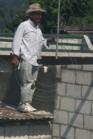 Puerto Quetzal, nr, Man on Roof V1115911a