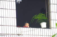 Fengjie, Girl in Window020401-5753