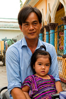 Mekong Delta, Father and Daughter on Motorbike V120-8601