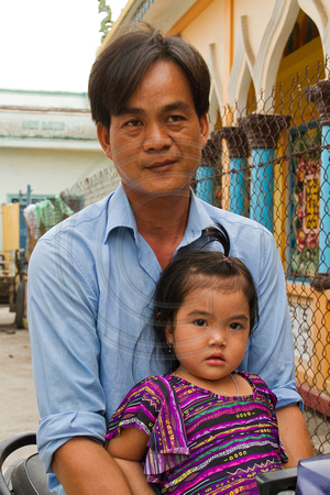 Mekong Delta, Father and Daughter on Motorbike V120-8601