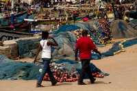 Elmina, Fishing Village, Men Working on Nets120-5600