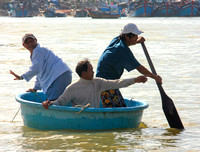 Nha Trang, Men in Round Boat0952326a