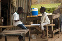 Senegal, Village, Kids at Table151-8188