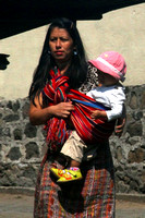 Puerto Quetzal, nr, Woman Carrying Child1115921a