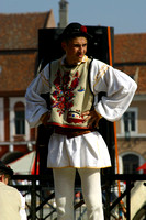 Brasov, Piata Sfatului, Man in Costume, V031003-1728